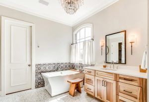 Gray Bathroom with Hickory Vanity and Freestanding Tub