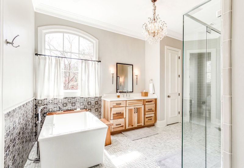Gray Bathroom with Soaking Tub and Glass Shower