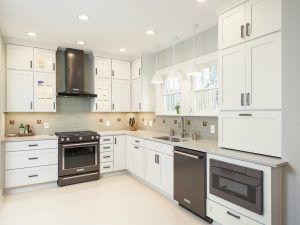 White Kitchen with Gray Backsplash