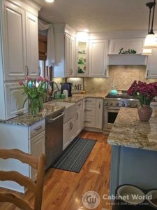 White Kitchen Cabinetry with Gray Island