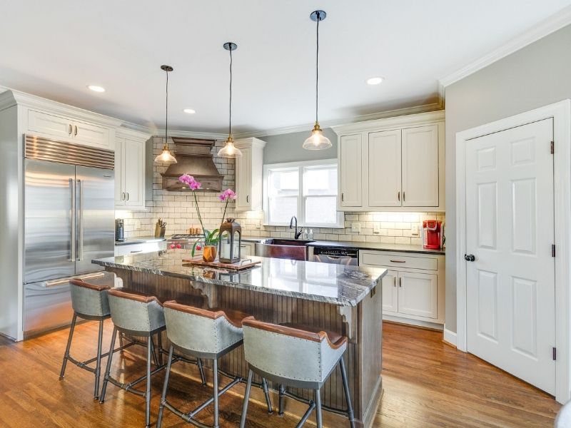 Kitchen island with online sink dishwasher and seating